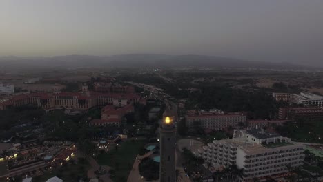 Aerial-scene-of-Maspalomas-tourist-town-and-lighthouse