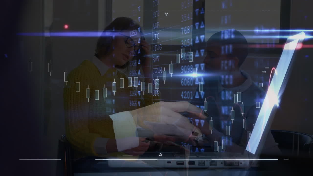 Two women collaborating at office desk, with stock candlestick charts and numeric tickers floating