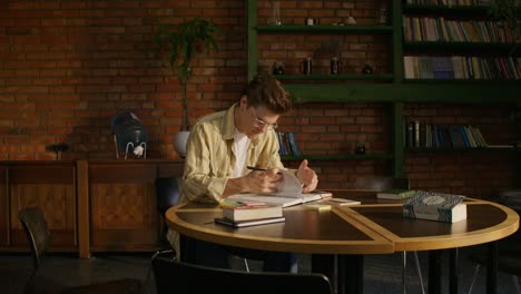 student studying in a cozy cafe