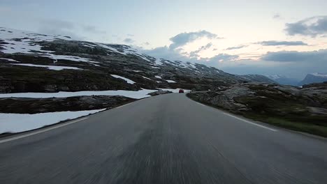 A-scenic-drive-through-the-Norwegian-countryside-following-another-vehicle