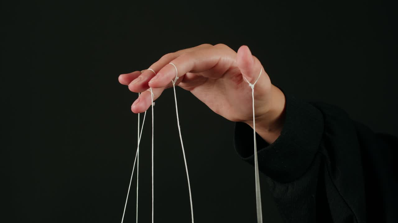 Human Hand Manipulating Strings Like a Puppeteer