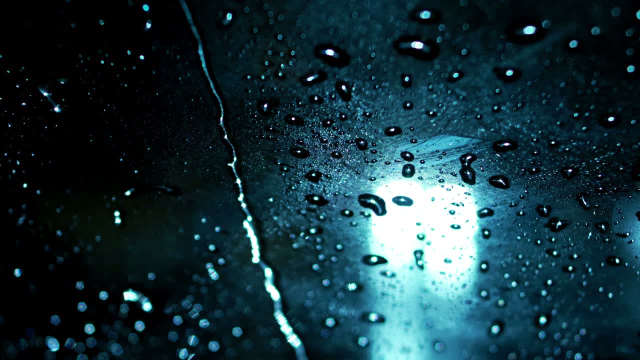 Rain drops on windshield of the car