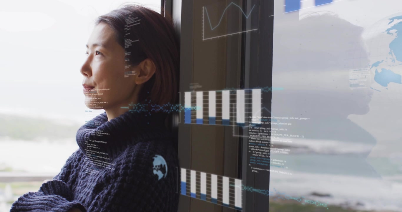 Adult woman standing arms crossed at glass overlooking sea gazing sparking tech graphs unfolding