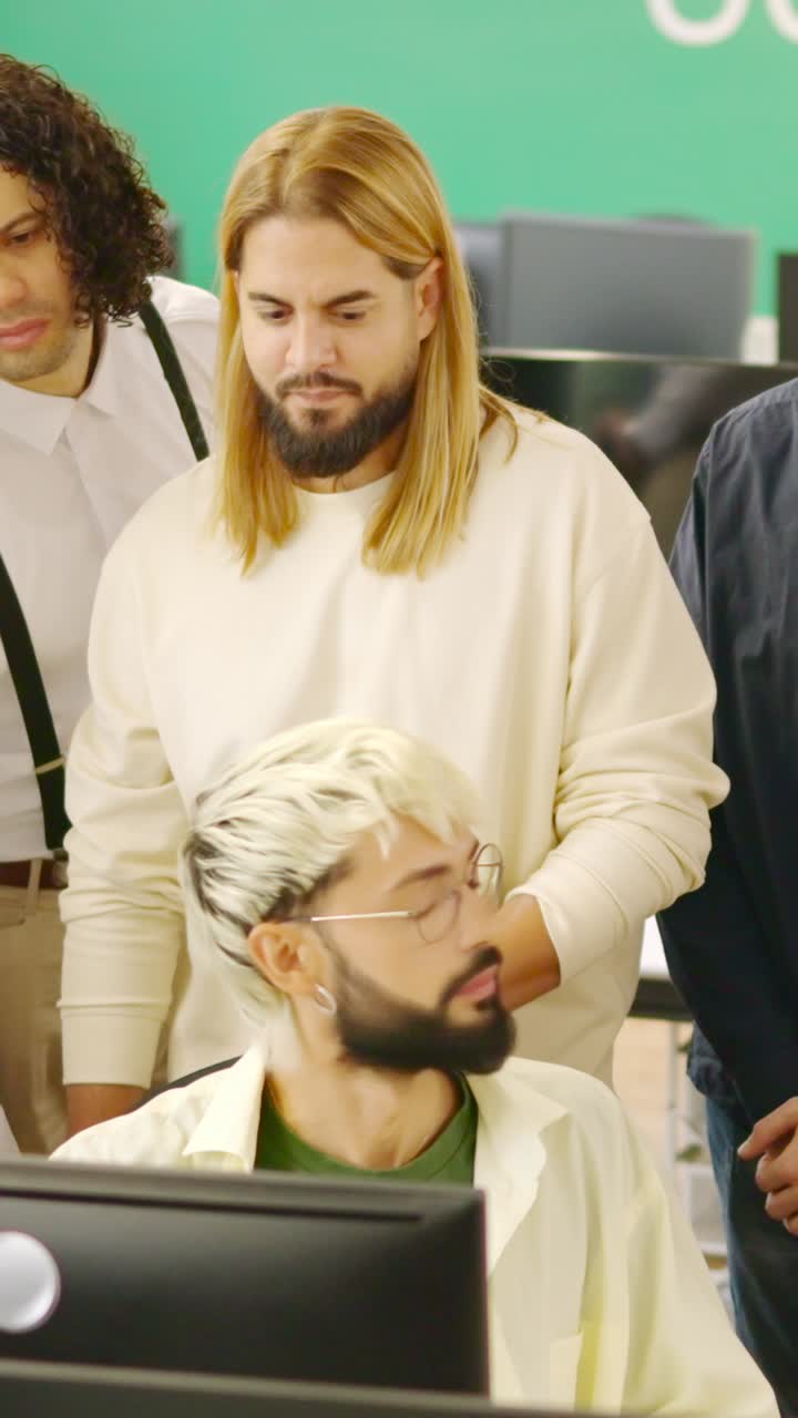 Modern man scolding colleagues seriously in a coworking space