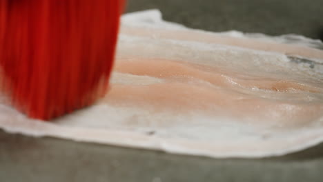 a rubber fake finger with blood close-up. make-up equipment props for films and shooting. bloody fake fingers for halloween and parties