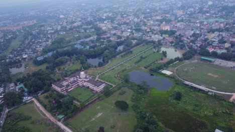 panoramic aerial view of historical monument cooch behar palace on the bank of river torsa in cooch behar city, west bengal