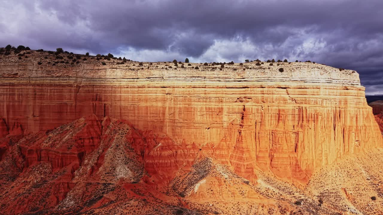 Visiting canyons in Spain with red rock formations and cloudy sky