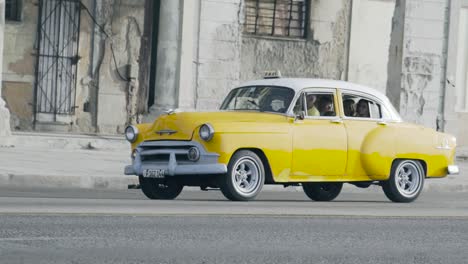 yellow taxi in havana, cuba