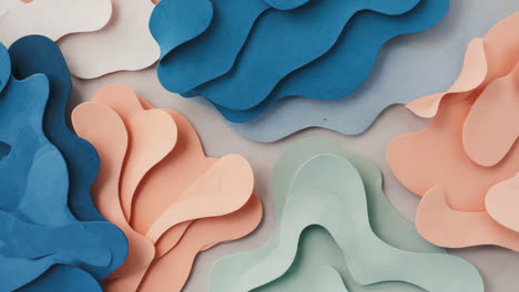 abstract wavy paper art with pastel colors