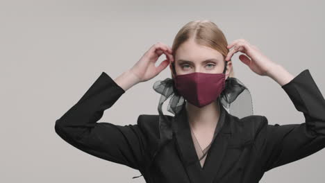 woman posing in stylish face mask