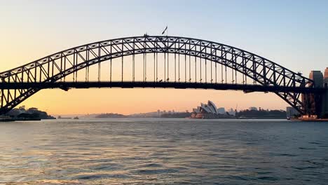 Beautiful-Epic-Sunrise-On-Sydney-Opera-House-and-Harbour-Bridge-In-NSW,-Australia---handheld-shot