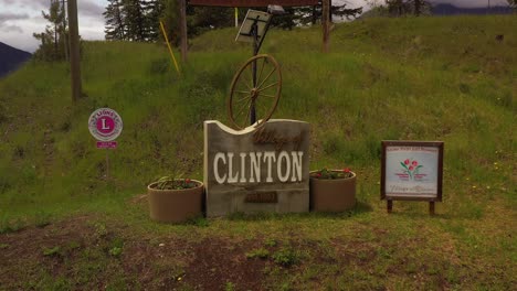 Clinton-Welcomes-You:-A-Stunning-Drone-Pullback-from-the-Town-Sign,-British-Columbia
