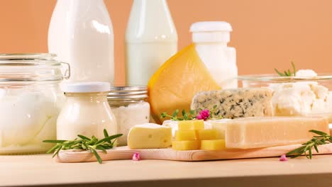 assorted dairy products on an orange background