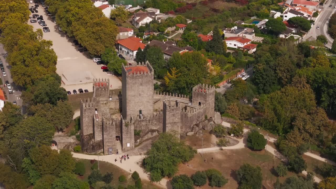aerial - Guimarães castle in northern Portugal with surrounding park