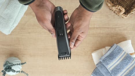 man holding a hair clipper