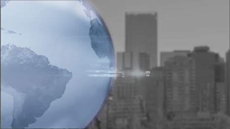 animation of spinning globe over cityscape