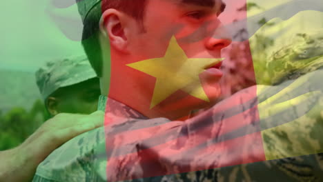 animation of flag of cameroon over soldiers