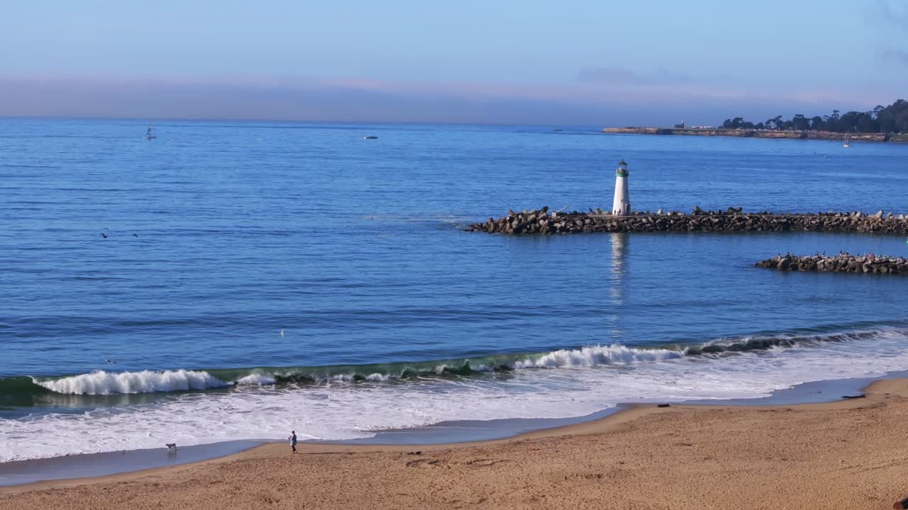 Peaceful Beach Scene with Lighthouse