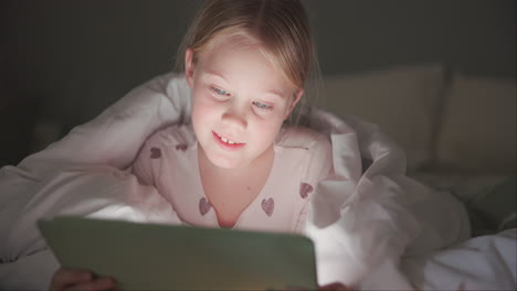 Girl,-child-and-tablet-in-bedroom-at-night