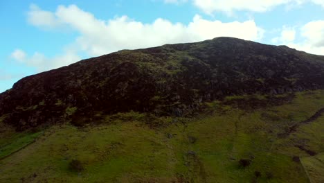 aerial shot of slemish mountain, situated in broughshane, county antrim in northern ireland