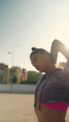 woman stretching outdoors