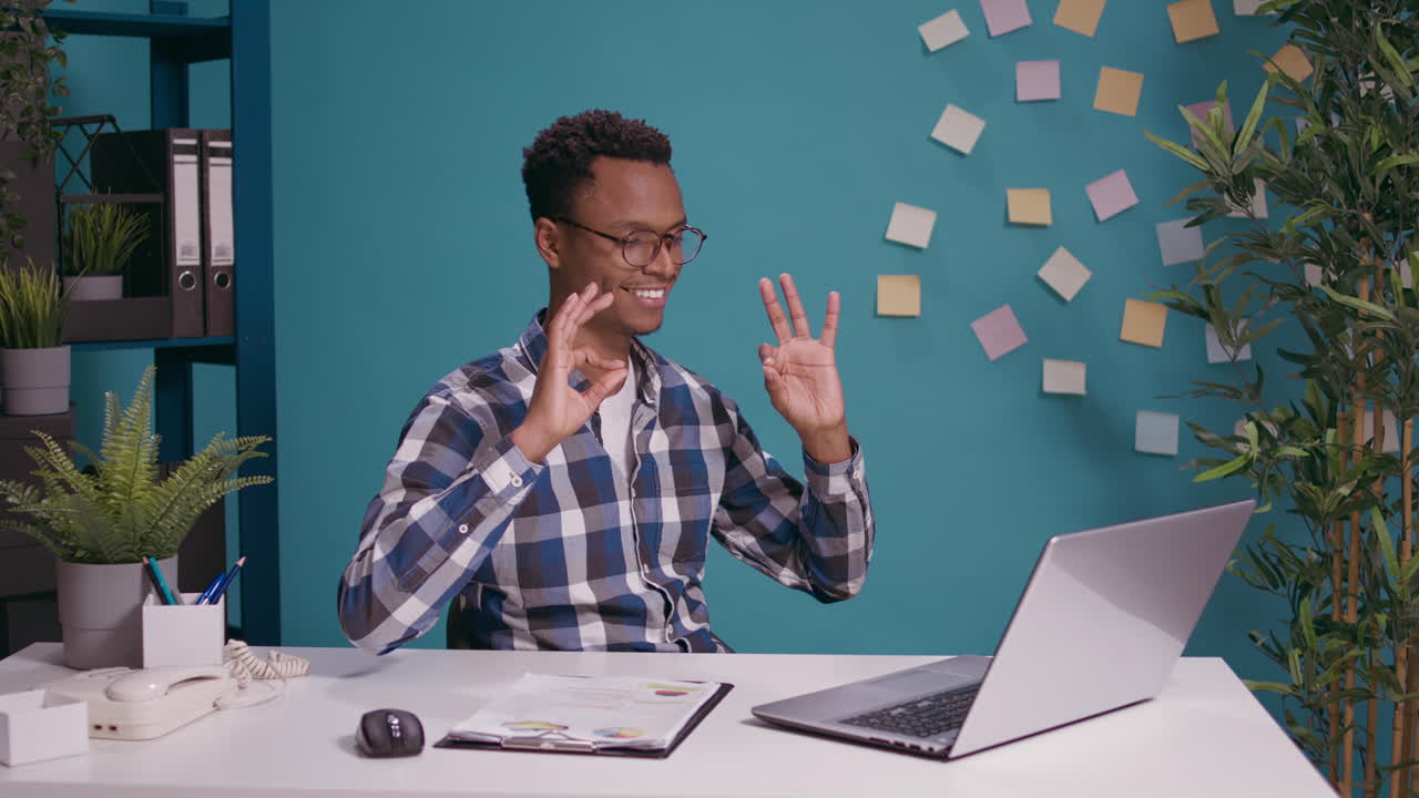 African american person showing okay and approval sign with hands