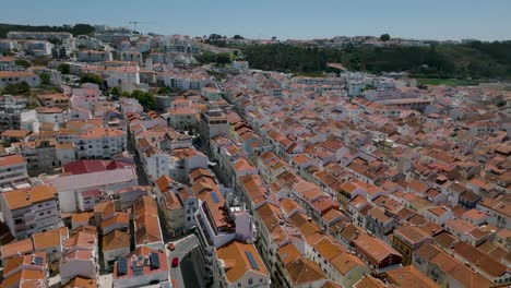 Drone shot of Nazar&eacute; beach from the city to the sea