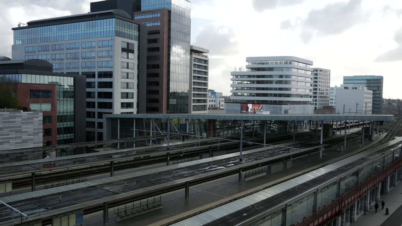 Belgian city skyline during the train is arriving at train station,static