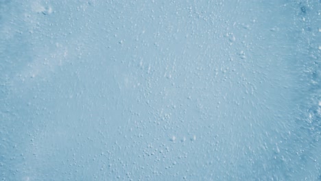 oxygen bubbles in water on a blue abstract background