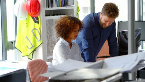 architects working together at desk 4k