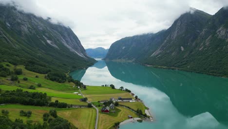 norway fjord, jolstravatn lake and small farm village sygnesand in sunnfjord, vestland - aerial