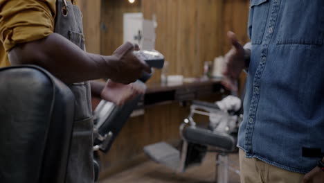 payment at a barber shop