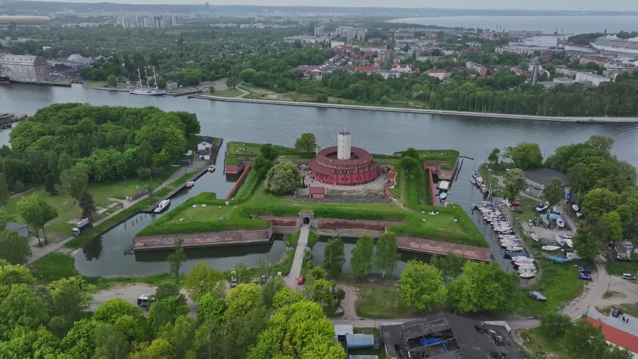 Fortress - a historic fortress in Gdańsk on the Martwa Wisła River, formerly located at the main entrance to the Gdańsk port at the mouth of the main arm of the Vistula River to the Baltic Sea