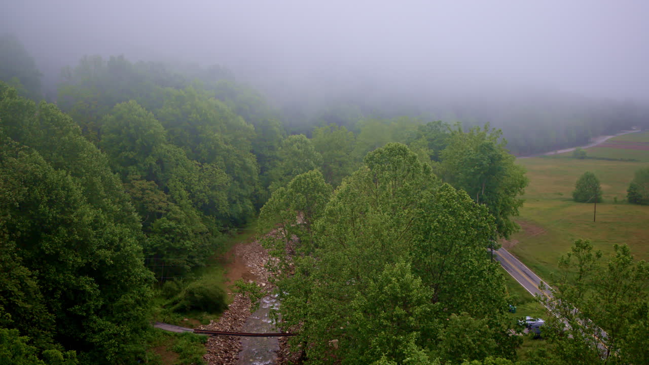 A quiet world of mist and mountain unfolds in this sweeping aerial of the Smokies