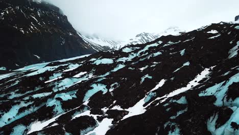 Vista-Aérea-Por-Drones-Del-Campo-Glaciar-En-Islandia,-Tierra-De-Fuego-Y-Hielo.