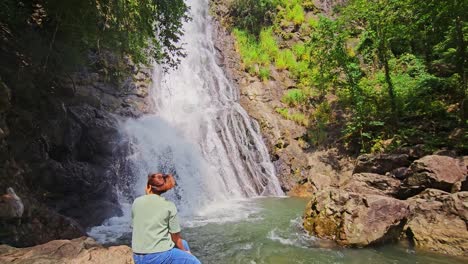 sarika waterfall in nakhon nayok, thailand. tilt down shot.
