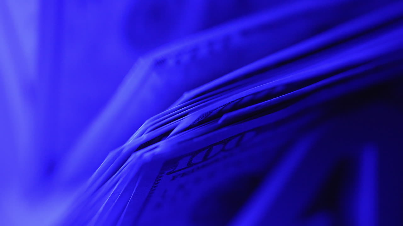 Close up of counting money in special machine. Currency financial banknote counter.