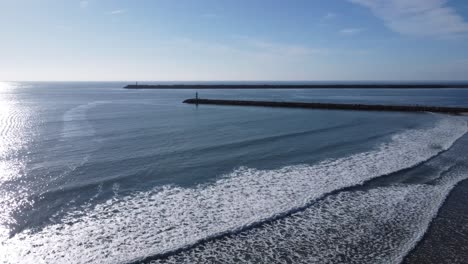 harbour walls at cabedelo beach near viana do castelo in portugal, sunny weather