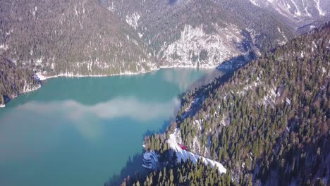 snowy mountain lake aerial view