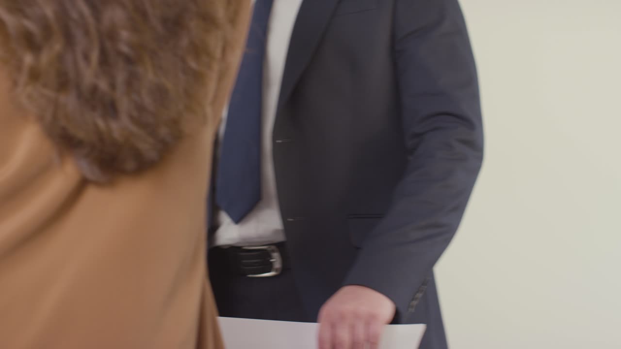 Close Up Of Candidate And Interviewer Shaking Hands In Office Before Job Interview 1