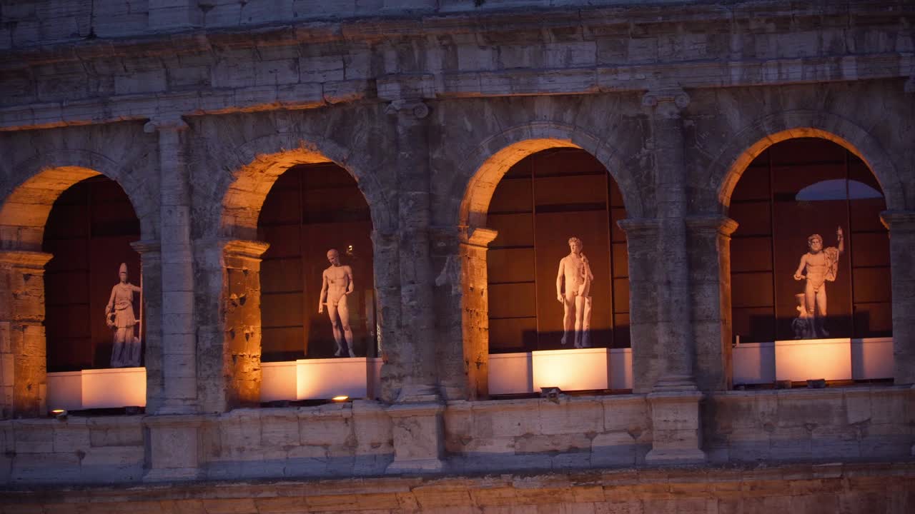 Camera shot of Colosseum at dusk in Rome