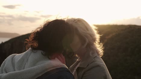 loving couple kissing in nature