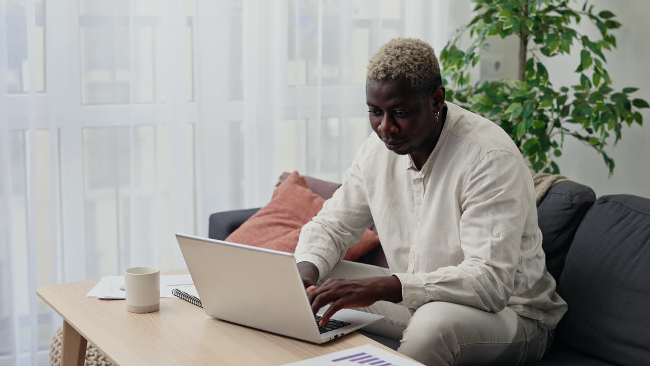 Man working from home on a laptop