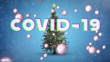 animation of covid -19 text, covid 19 cells moving over winter scenery with christmas tree