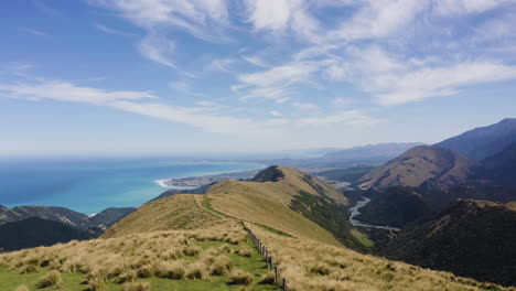 the rolling hills and mountains of new zealand overlook the stunning beaches in kiakoura