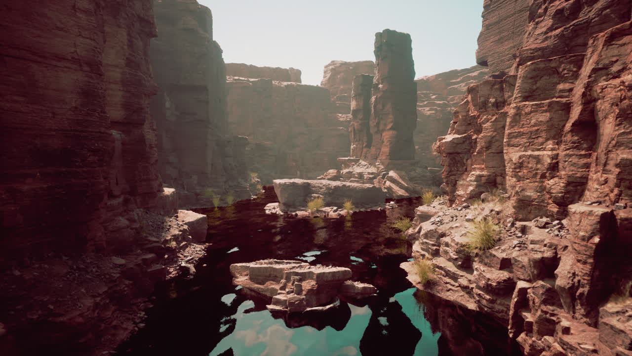 거대한 빨간 바위의 계곡을 가로질러 흐르는 강