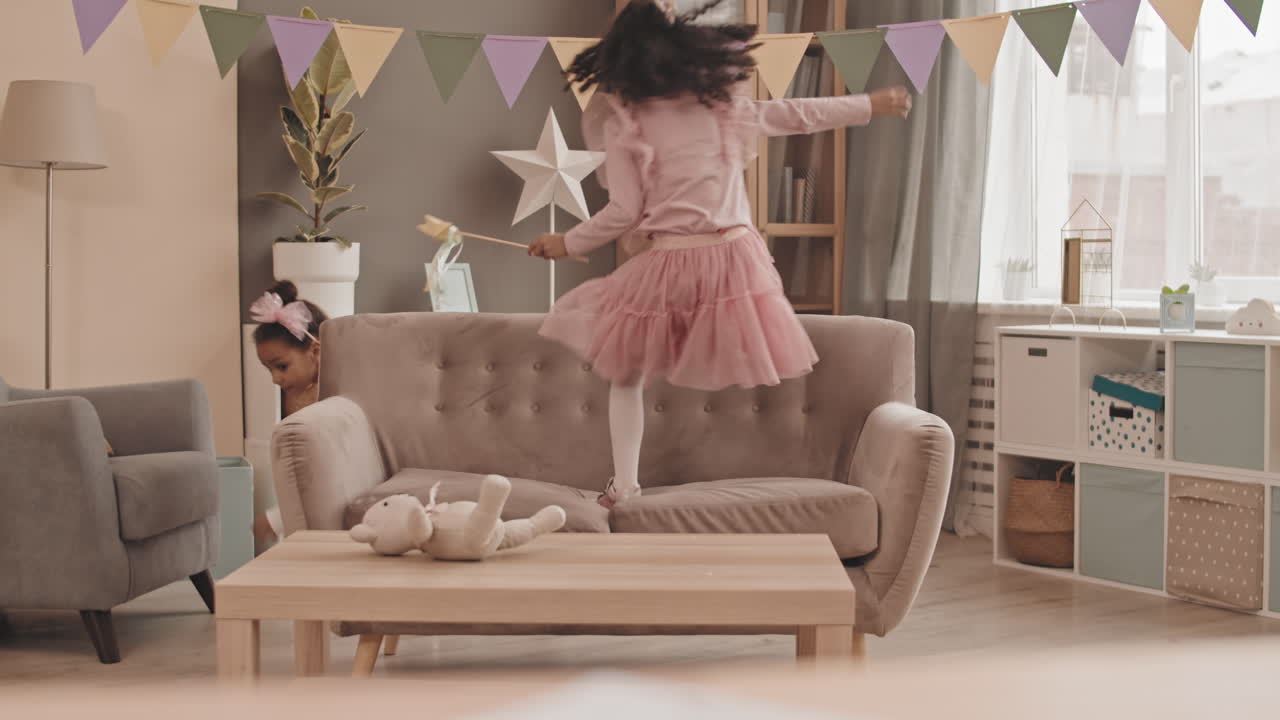 Female Kids Running Around Room