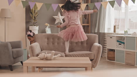 female kids running around room