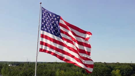 circling american flag waving in the wind, close up