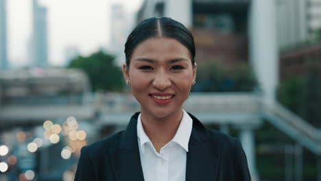 smiling business woman in a city